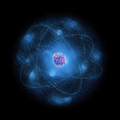 Representació divulgativa d’un àtom mostrant el gran espai buit entre el nucli i els electrons